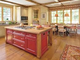 Warm Traditional Kitchen With Red Island Yellow Country Kitchens Kitchen Island Design Kitchen Design Color