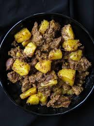 Slow Cooked Indian Beef And Potato Curry Aloo Gosht Island Smile Recipe Beef And Potatoes Potato Curry Indian Food Recipes