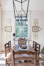 Black Cage Lantern Chandelier Over The Dining Table Antique Art Gallery Walls Bleached Pine Sh Dining Room Design Rustic Dining Room Dining Room Chandelier