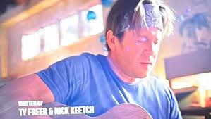 What tune is the person in the image humming?