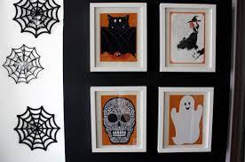 I bought one of the black drapes, but didn't end up using it for this project (which is why you see it in the pic below) Budget Friendly Diy Halloween Wall Art Eieihome