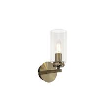 The elegant crystal candle wall sconces is made of the crystal material, and royal golden color of the wall sconces could make the room very shinning. Wall Light In Antique Brass Clear Glass Cylinder Shade Lighting