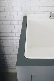 I came up with the idea of the corner sink base. How To Hide Your Utility Sink Faux Cabinet Tutorial Within The Grove