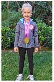 Sooooo, i found a white long sleeve onsie she already had and grabbed some red white and blue felt from the craft store. My Fab Five Olympic Gymnast Gymnast Costume Halloween Olympics Costume Kids Costumes