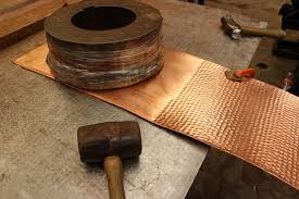 Hammered copper coffee table made from an old heating cylinder. 6 Reasons To Use A Copper Coffee Table Coppersmith