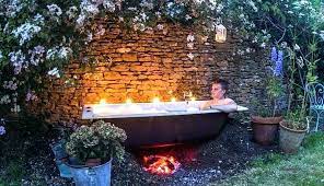 The livestock tanks are occasionally used for a hot soaking tub. 20 Homemade Hot Tubs That Are Budget Friendly
