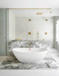 While you want as much natural light as possible, you also want to ensure privacy. Be Amazed By Unique Bathroom Ideas Where Brass Plays The Leading Role 7 Covet Edition