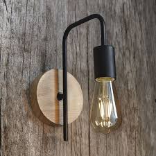 wandleuchte aus schwarzem metall und kautschukbaum maisons du monde wandleuchte moderne lampen wandlampen