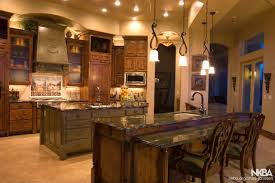 Tuscan homes have their history traced back to the elegant and country style homes in the tuscany region of italy. Tuscan Kitchen With 2 Islands Nkba