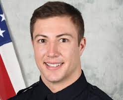 Arvada police officer fatally shot while responding to "large family  disturbance"