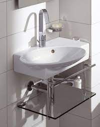 Corner bathroom sinks were designed to be installed in a corner created by two adjoining walls. Corner Bathroom Sinks Creating Space Saving Modern Bathroom Design Corner Sink Bathroom Small Bathroom Vanities Small Bathroom Sinks