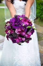 Rose & lizzy flower bouquet. Purple Wedding Bouquets Arabia Weddings