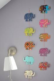 Sorting and stacking nesting bowls. 30 Diy Ideas Tutorials For A Cute Baby Room Noted List