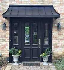 The Bronze Metal Juliet Door Awning In Franklin Tn House Awnings Door Awnings Colonial House Exteriors
