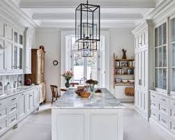 White kitchen ideas (photos) colonial remodel in white with light wood above is a remodeled kitchen done in mostly white with natural light wood floors and wood island surface. 25 White Kitchen Ideas Photos And Tips For White Kitchens Homes Gardens