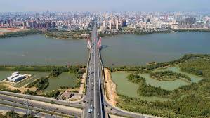 River in autumn park on a sunny day. Forest Cities Boosting Eco Protection Incomes Cgtn