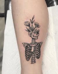 Ribcages And Flowers Scream The Old You What Changed Minimalisttattoos Skull Tattoo Forearm Tattoos Small Tattoos Tattoo Styles
