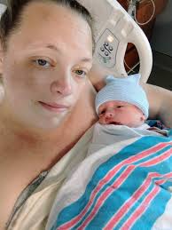 Baby born via c-section after complications