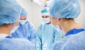 Group Of Surgeons In Operating Room At Hospital Operating Room Surgeon Hospital Photos