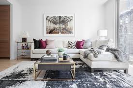 A silver mirror can act as a center point in the room and add brightness and glamor. A Modern Luxe New York Apartment Daily Dream Decor