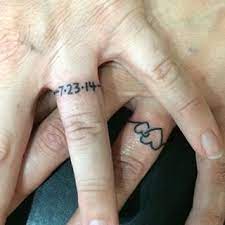 Combine The Special Date And The Symbol Of Your Love Tattoo Wedding Rings Engagement Tattoos Wedding Ring Tattoo