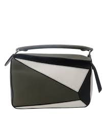 Calf, buffalo calf, smooth calf, nappa, pearlized the loewe puzzle bag was launched in 2015 by designer jonathan anderson who is the creative director at loewe and founder of fashion label jw anderson. Puzzle Bag Loewe Designer Exchange Buy Sell Exchange