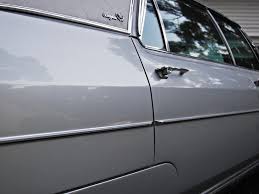 Image result for Starlight Silver 1965 Cadillac