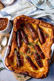 Using a whisk, mix the eggs with the milk and sparkling water in a jug. Toad In The Hole With Red Onion Gravy Nicky S Kitchen Sanctuary