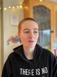 Siblings shave their heads to raise funds for Ukraine