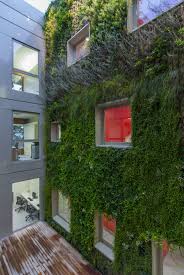 Massimo Mariani Alessandro Champi Bank Piza Fornacette Divisare With Images Vertical Garden Indoor Landscaping Inspiration Vertical Garden