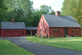 The cap's slope allows water to flow away from the chimney. Cape Early New England Homes
