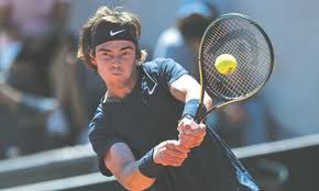 His favourite surface is clay, shot is backhand and tournament is roland garros. M0xjdvy0veqzom