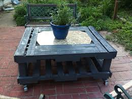Back Patio Table Made With 3 Used Pallets And Scrap Granite Piece Only Monetary Costs Was Added Wheels Recycled Granite Patio Party Decorations Granite Table