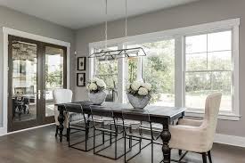 Dark Brown Dining Table With See Through Dining Chairs Transitional Dining Room