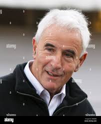Nick Zito, trainer of Kentucky Derby entrants Anak Nakal and Cool Coal Man,  talks with reporters in the stable area of Churchill Downs in Louisville,  Ky., Saturday, May 3, 2008. (AP Photo/Garry