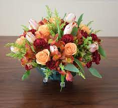 Table Centerpiece With Alstroemeria Roses Tulips Mini Carnations Salidago Free Tropical Flower Arrangements Fresh Flowers Arrangements Flower Arrangements