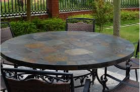When it comes time to creating a patio, a round garden table will be one of your first purchases. How To Make A Right Choice Of Patio Dining Table Decorifusta Slate Patio Patio Garden Table