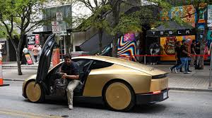 Tesla Cybercab robotaxi displayed in Austin during the company’s launch event