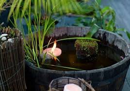 A pond fountain will improve your overall water quality and reduce algae growth. 7 Fun Ways To Create A Water Feature From Half Whiskey Barrels Container Water Gardens