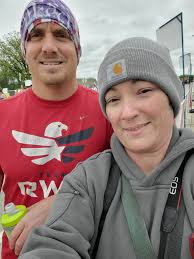 Finishing first race after ACL surgery with daughter