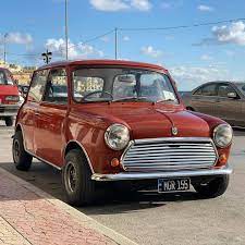 Small Car Big Heart Mini Cooper Classic Classic Mini Mini Cars