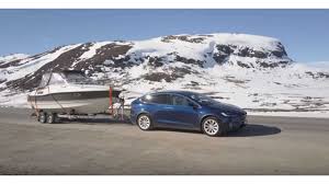 Abrupt changes in tesla model pricing are nothing new, but this particular one may have just set a record for the shortest time a vehicle variant was tesla introduced a standard range rwd version of the model y during the first week of january 2021, offering a range of 244 miles and a starting. Tesla Model X Tows Boat Up A Mountain Video