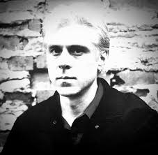 Bill Rieflin played drums for The Blackouts starting in 1979. His bandmates  included his brother Raymond, Paul Barker, Roland Barker and Erich Werner.  Eventually that band dissolved and Paul Barker joined the