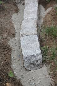Asphalt driveway edging with cobblestone pavers. 30 Lawn Edging Designs For You To Pick Garden Edging Stone Edging Lawn Edging