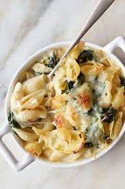 Nyt Cooking Toss Spinach Artichoke Dip With Pasta And It Feels Right At Home On The Dinner Table This Recipe Artichoke Pasta Spinach Artichoke Pasta Recipes