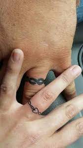 48 Sweet Wedding Ring Tattoos Tattoo Wedding Rings Wedding Band Tattoo Jewelry Tattoo