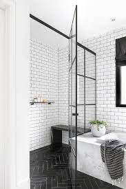 Zero Level Shower Floor Finished With Black Herringbone Tiles In A Modern Master Bathroom Boasting W Black Herringbone Tile Amazing Bathrooms Bathrooms Remodel