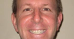 North Shore investor has Deere cap, will buy farmland