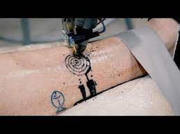 We are building an autonomous tattooing robot controlled by computer vision. Getting A Tattoo From An Industrial Robot Looks Intense Tomorrow Daily 404 Youtube