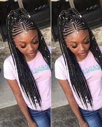 The combination of textures is the real winner here. Weave Braided Hairstyles For Black Girls Fulani Braids Hairstyles Black Hair Box Braids Braids Hairstyles